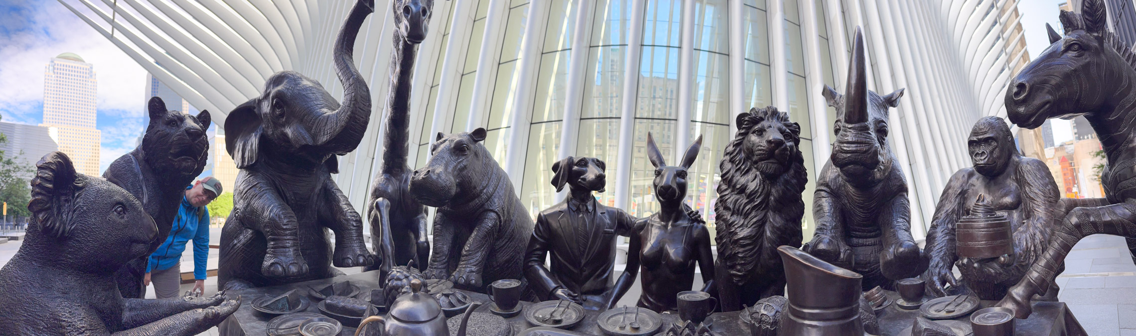 The animal figures at the coffee table in front of the World Trade Center