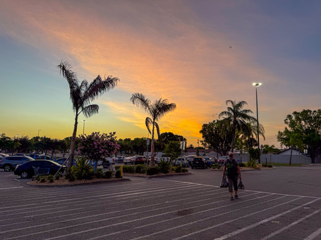Sunset in Cape Coral in front of Walmart with shopping in hand